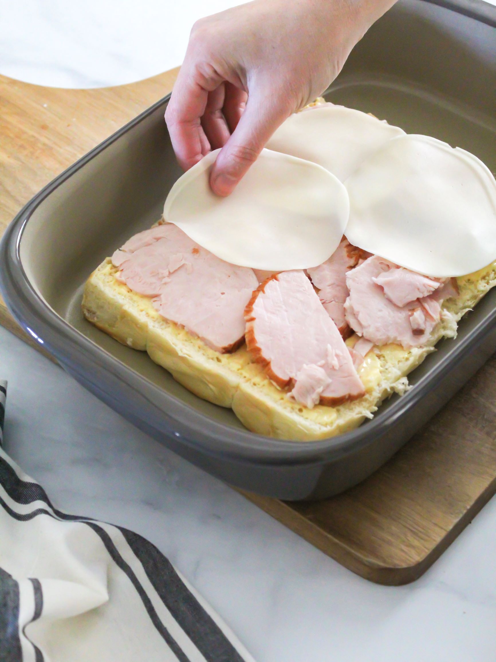 Adding the Turkey and Provolone to the Sliders 