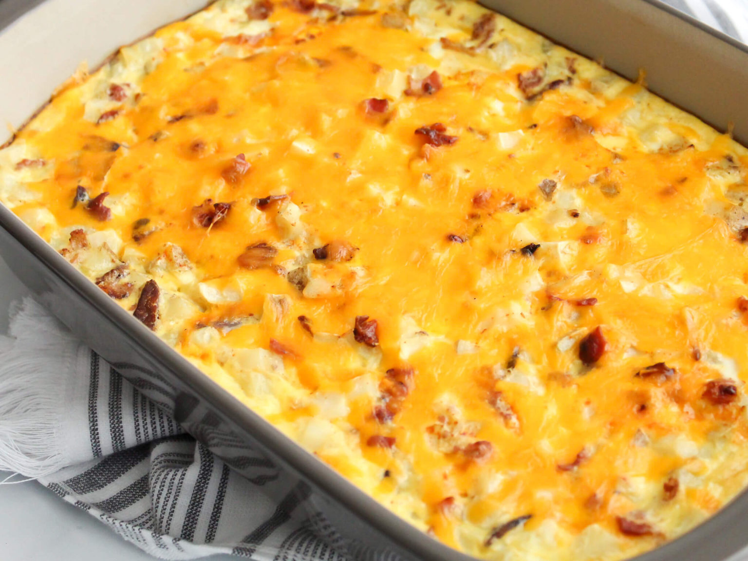 Easy Cheesy Bacon Egg and Potato Breakfast Bake - Midwest Life and