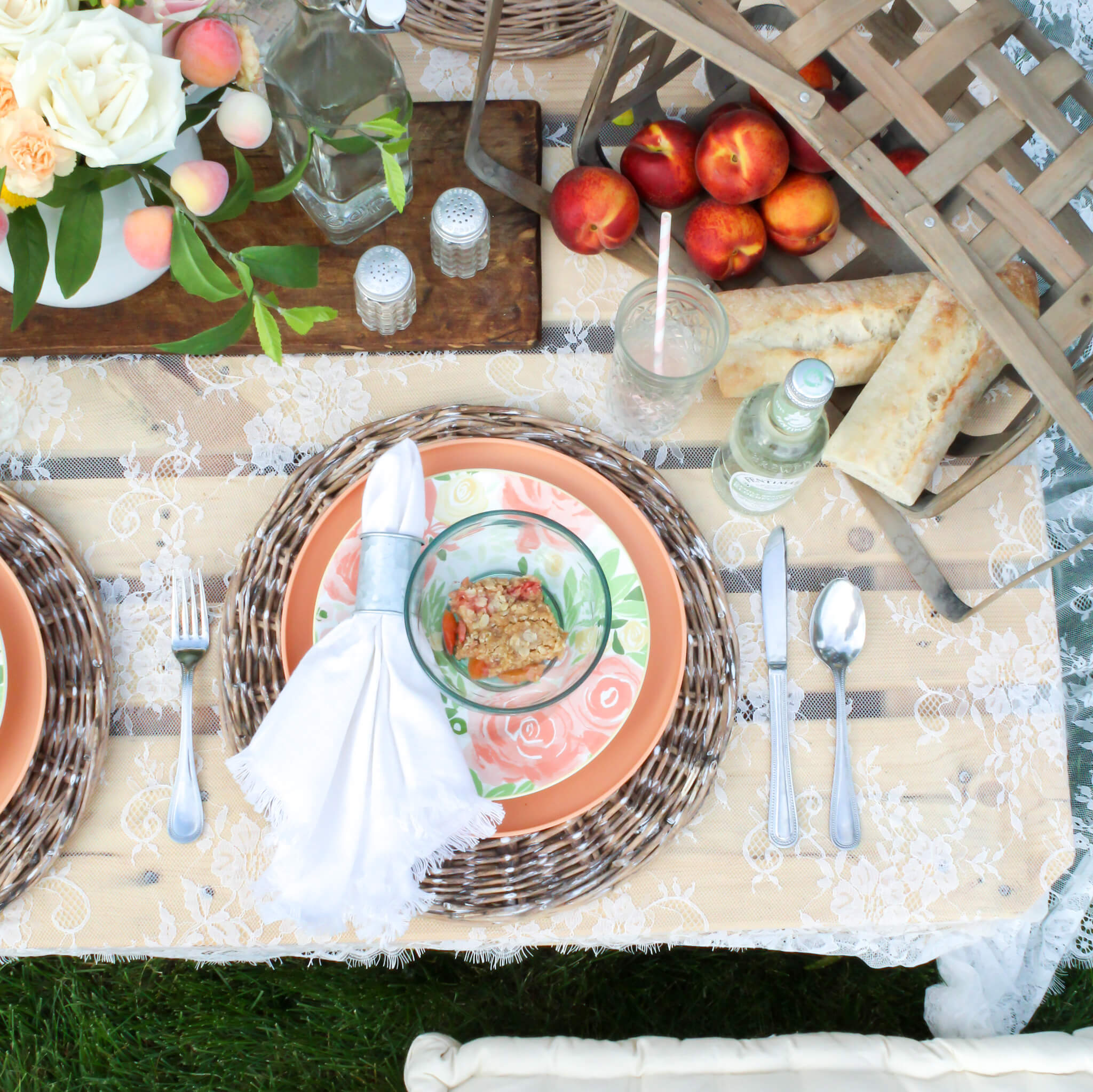 Overhead view of summer boho-style picnic set up in the backyard