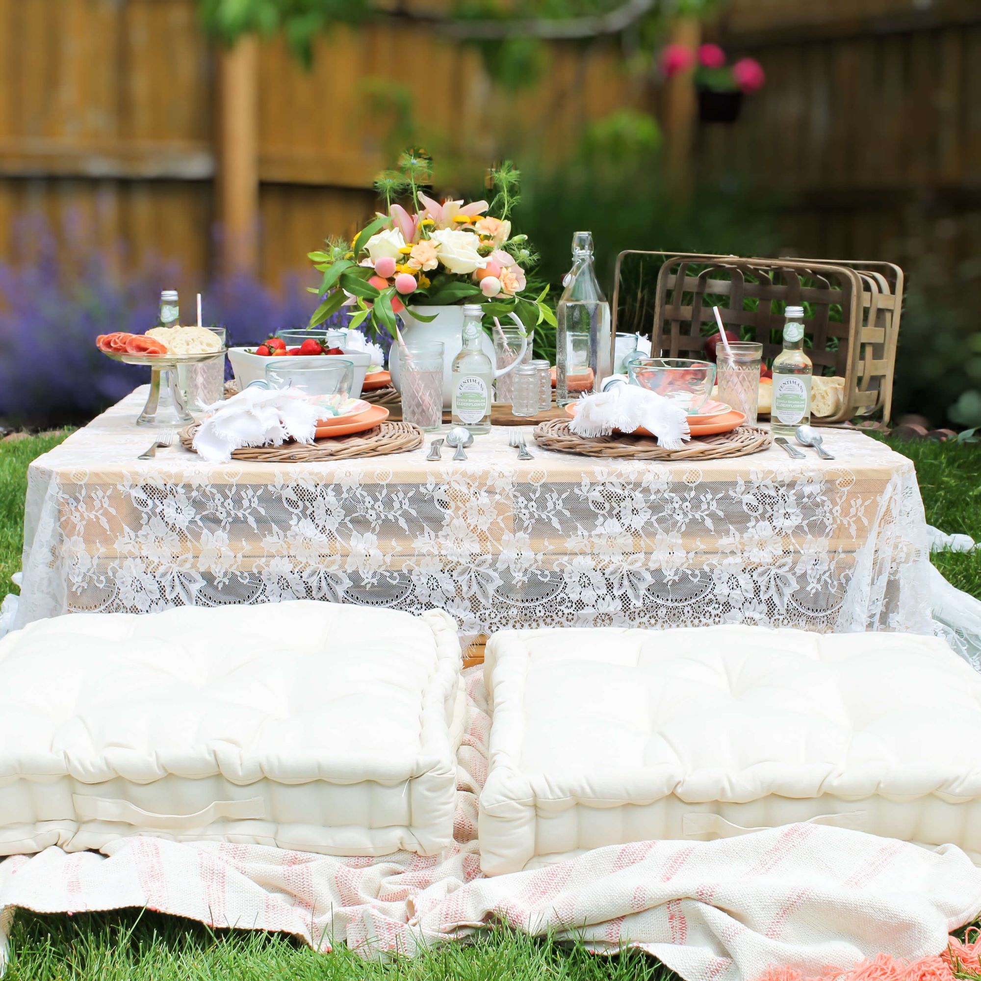 Boho summer picnic set up in the backyard