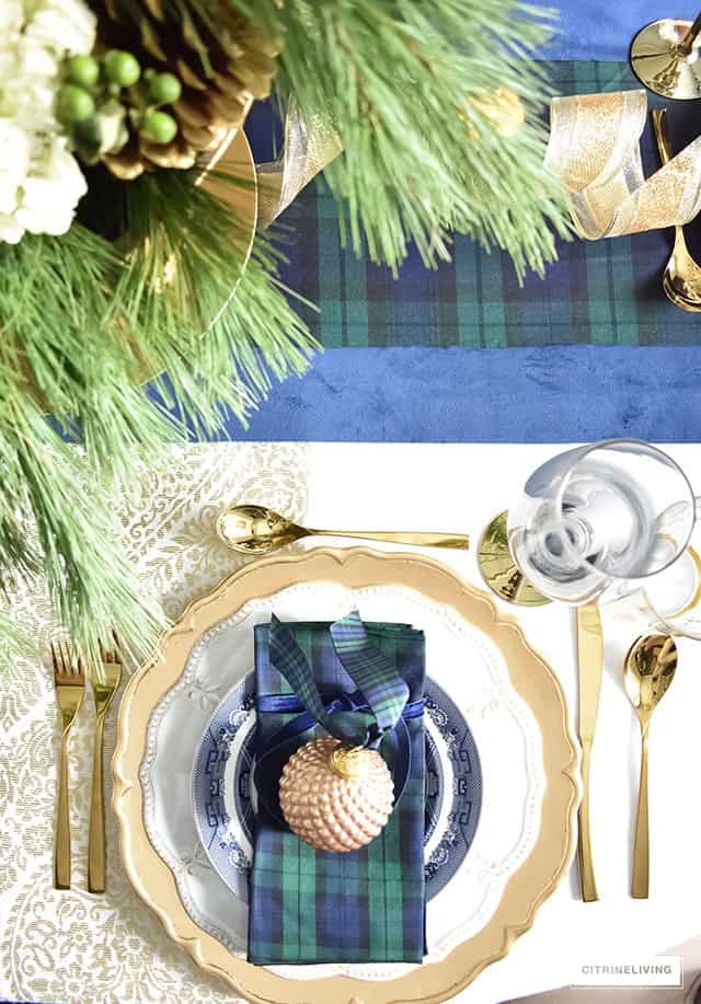 Christmas tablescape decorating ideas using blue, green, gold, and tartan plaid accents
