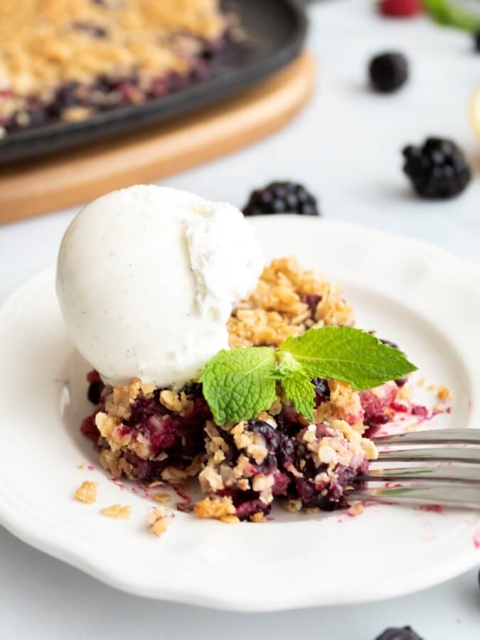 https://www.midwestlifeandstyle.com/wp-content/uploads/2022/06/Cast-Iron-Triple-Berry-Crisp-25-Midwest-Life-and-Style-Blog.jpg