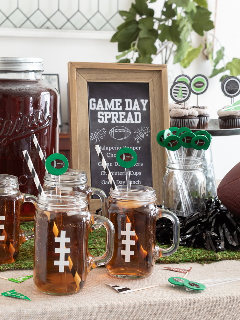 Drink buffet sprad for a game day with drinks and a chalkboard menu