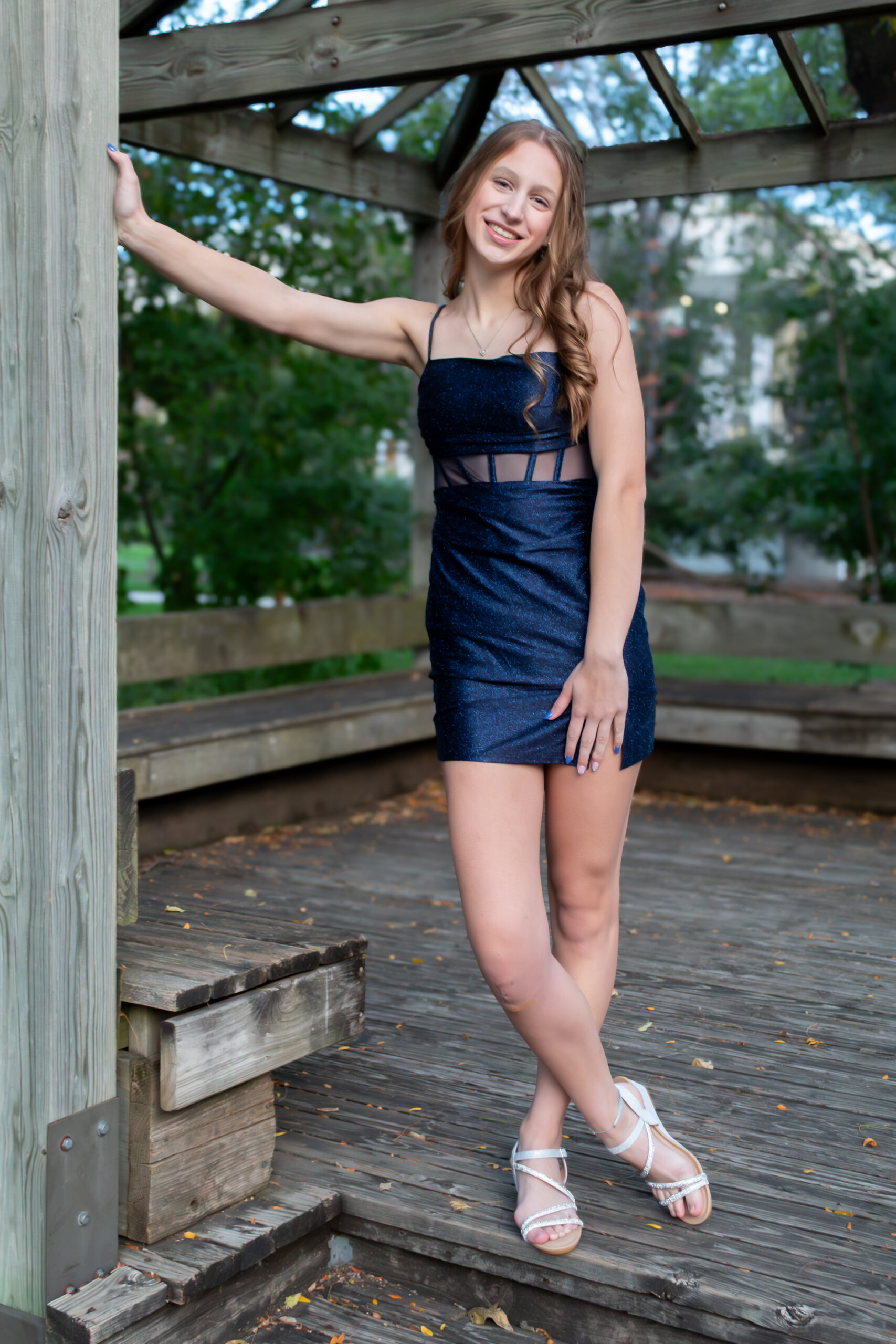 Girl in blue sprakle formal dress for homecoming