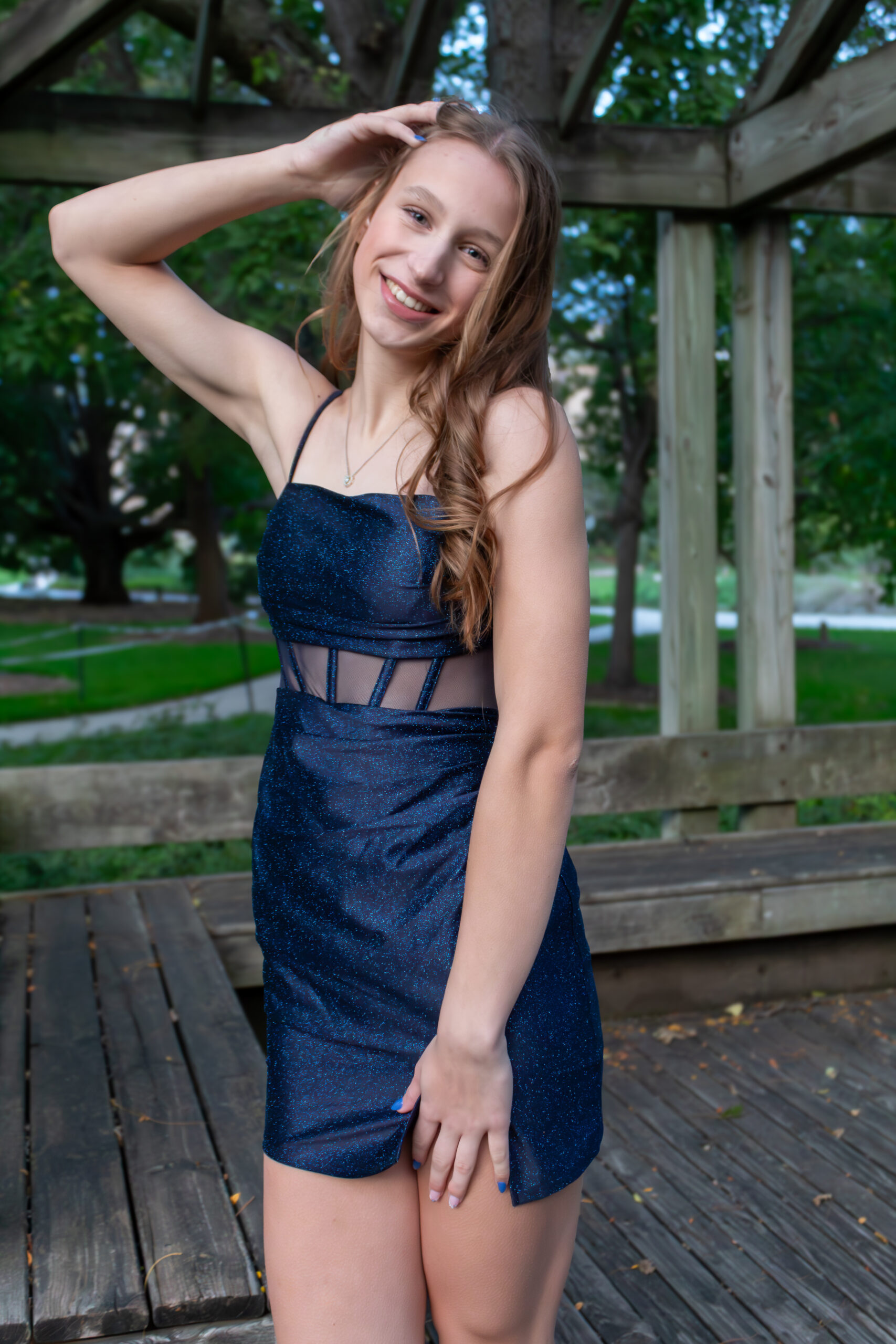Girl in blue sprakle formal dress for homecoming