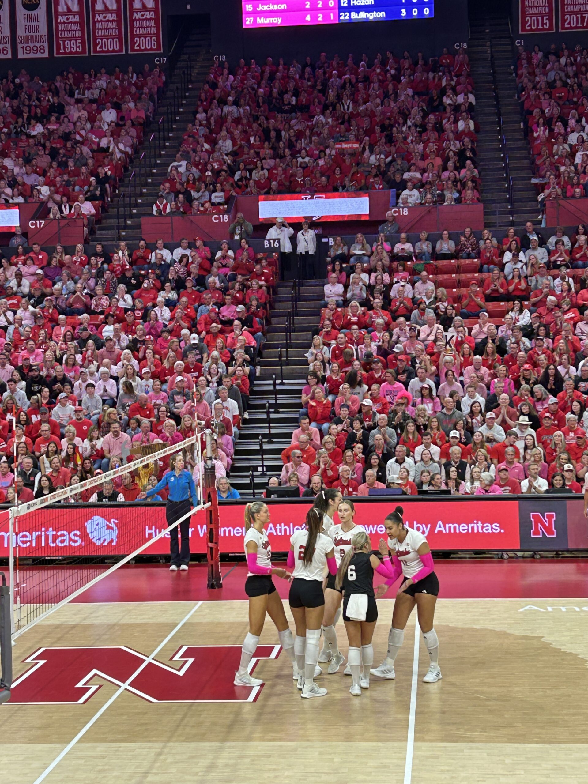 Nebraska Husker volleyball team playing a game at Bob Devaney Sports Center