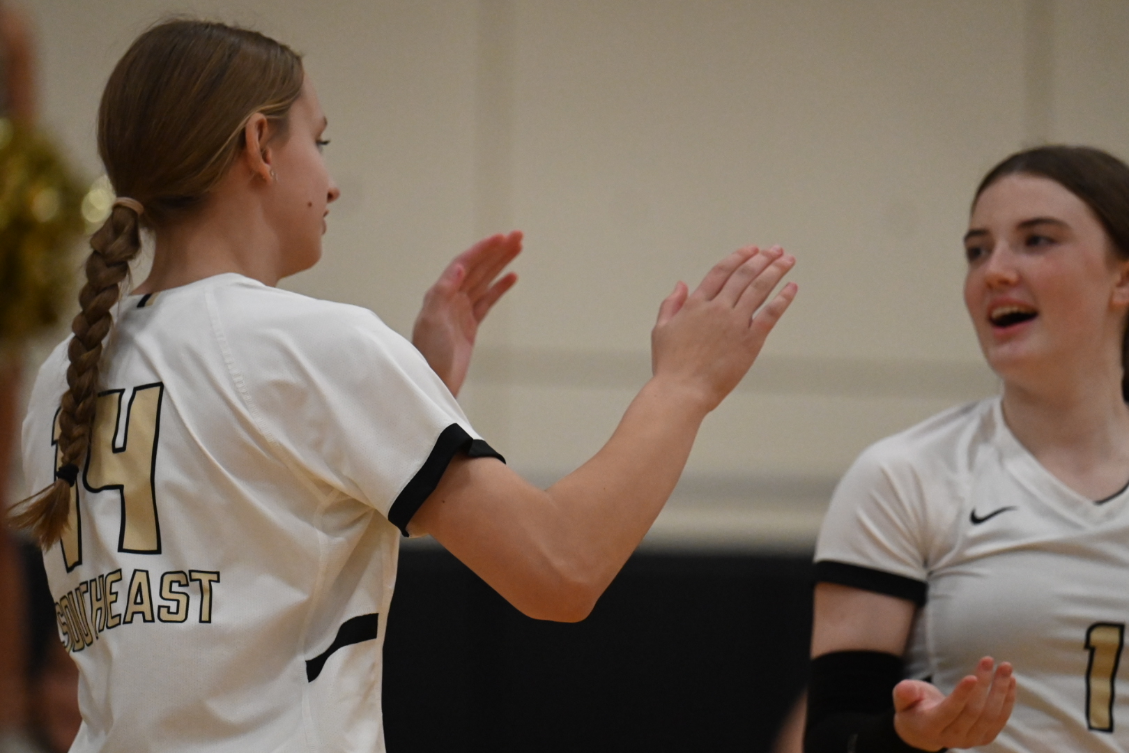 volleyball player high fiving