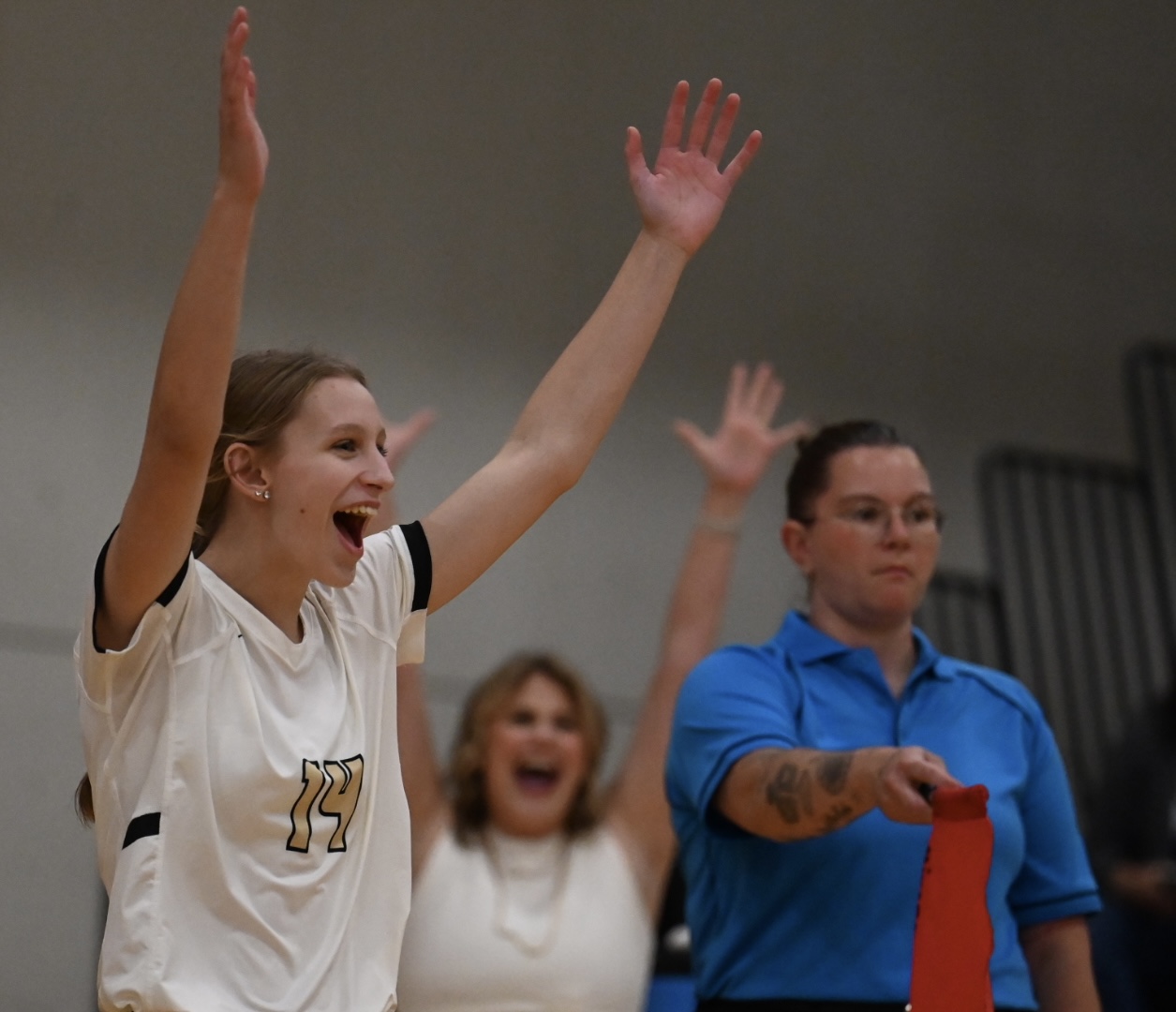 player celebrating an ace serve in a volleyball match