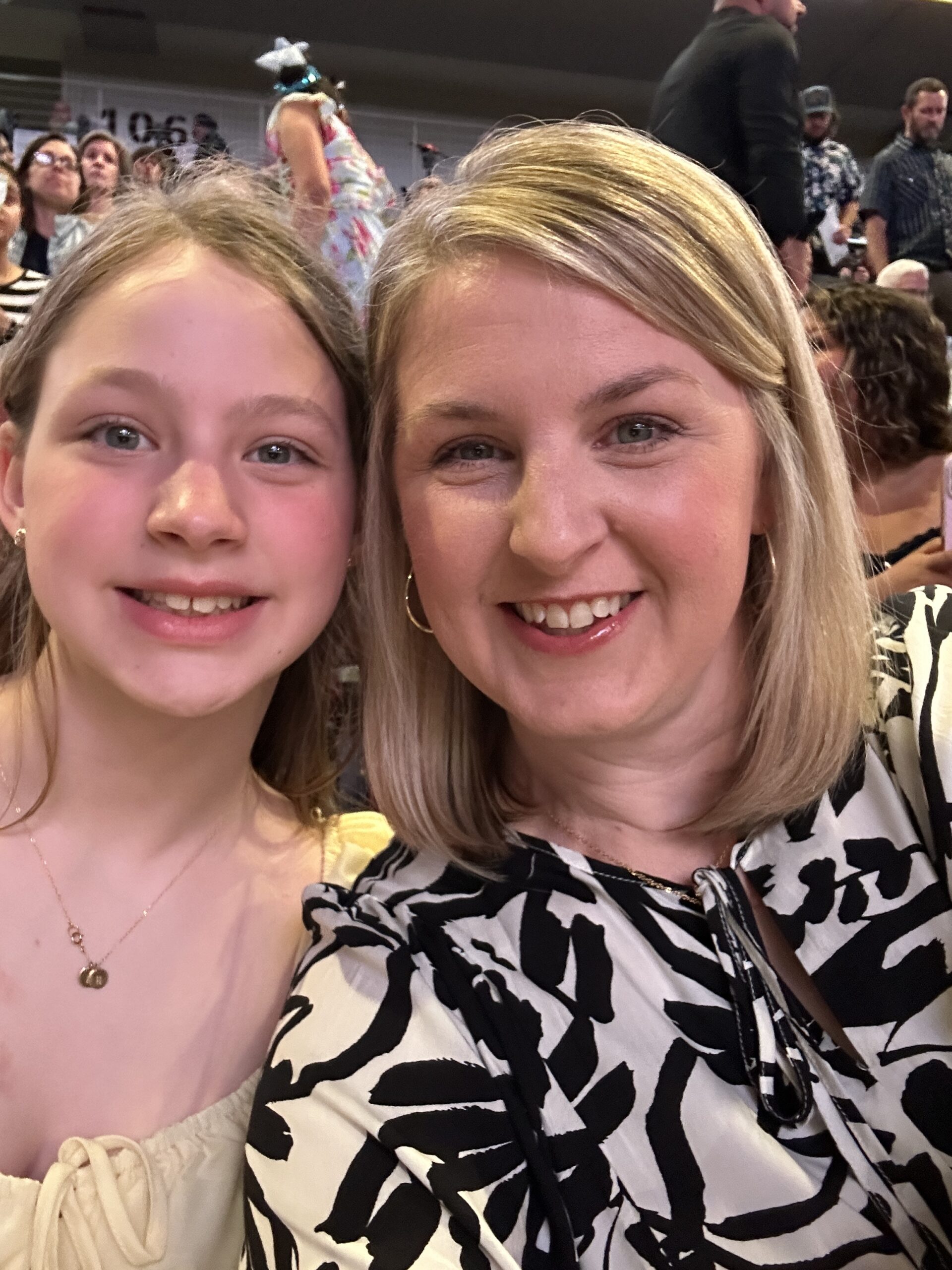Selfie of a mom and daughter taken in the crowd during the graduatoin ceremony
